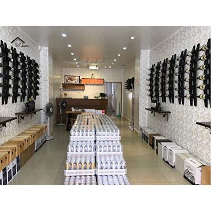 Store interior with multiple wine racks on walls